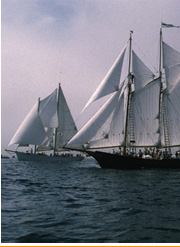 Thomas E. Lannon under sail (right) built by Harold A. Burnham
