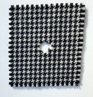 Hounds tooth wool with hole to be repaired, Needle arts, 2016; Toni Columbo; Boston, Massachusetts; wool; Photography by Maggie Holtzberg