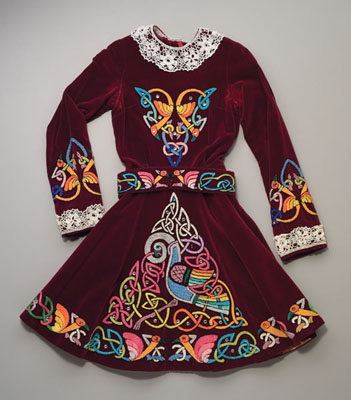 Dress, Irish stepdancing costume, 1980; Ann P. Horkan (b. 1936); Osterville, Massachusetts; Maroon velvet, cotton, satin embroidery; 37 x 20 x 3 in. hanging, skirt open wide; Collection of the artist; Photography by Jason Dowdle