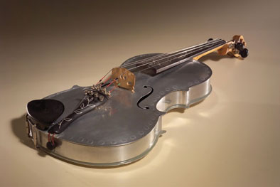 Violin, Musical instrument maker, 2003; Robert P. Langdon; Pittsfield, Massachusetts; Aluminum, wood, strings; 24 1/4 x 8 1/4 x 3 3/4 in.; Collection of the artist; Photography by Jason Dowdle