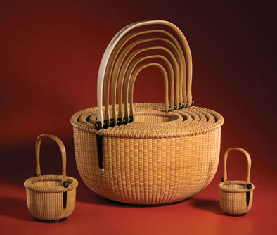 Nest of Nantucket lightship baskets, Nantucket basketry, 2007; Karol Lindquist (b. 1948); Nantucket, Massachusetts; Oak staves, cane weave, cocobola base, ebony ears; Nested, handles up: 16 x 13 7/8 x 13 7/8 in.; Collection of Donna and Greg Brown; Photography by Jason Dowdle
