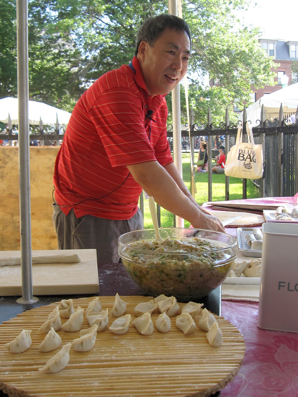 Max Gow demonstrating the making of Chinese dumplings, Foodways, 2014; Max Gow; Burlington, Massachusetts;