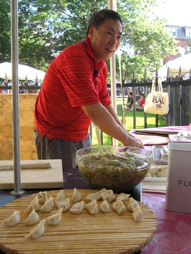 Max Gow demonstrating the making of Chinese dumplings, Foodways, 2014; Max Gow; Burlington, Massachusetts;