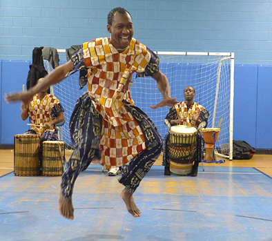 Sidi Joh Camara performing, West African dance and drumming, 2017; Sidi Mohamed Camara; Dorchester, Massachusetts;