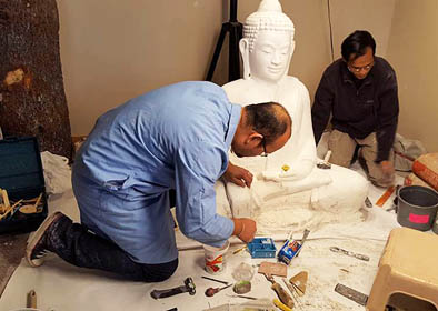Yary Livan and Panit Mai working on Buddha sculpture, Cambodian ornaments, 2016; Lowell, Massachusetts;