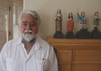 Carlos Santiago Arroyo with santos; Puerto Rican woodcarving; 2005: 