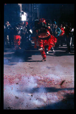 Dancer amidst fireworks; Ethnic festival; 2001: Chinatown, Boston, Massachusetts
