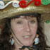 Robyn Clayton posing in her kitchen; St. Peter's Fiesta Hats; 2012: Gloucester, Massachusetts
