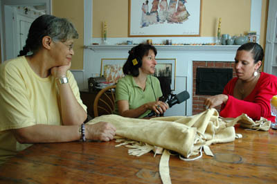 Anita Peters Little and Michelle Fernandes being interviewed by Maggie Holtzberg. Photography by Russell Call; Apprenticeship - Native regalia; 2006: West Barnstable, Massachusetts